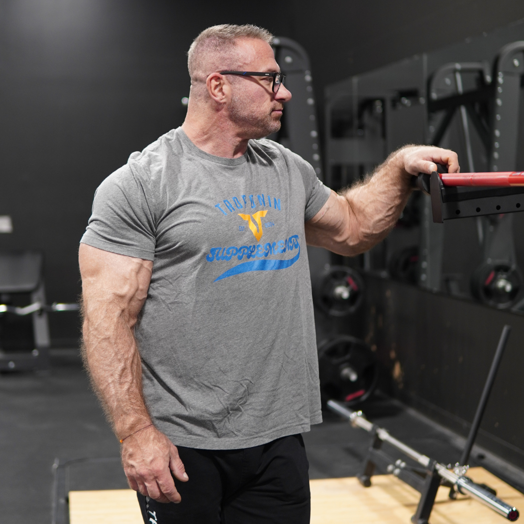 Troponin Supplements retro baseball tee — short-sleeve athletic shirt with contrast raglan sleeves and brand logo
